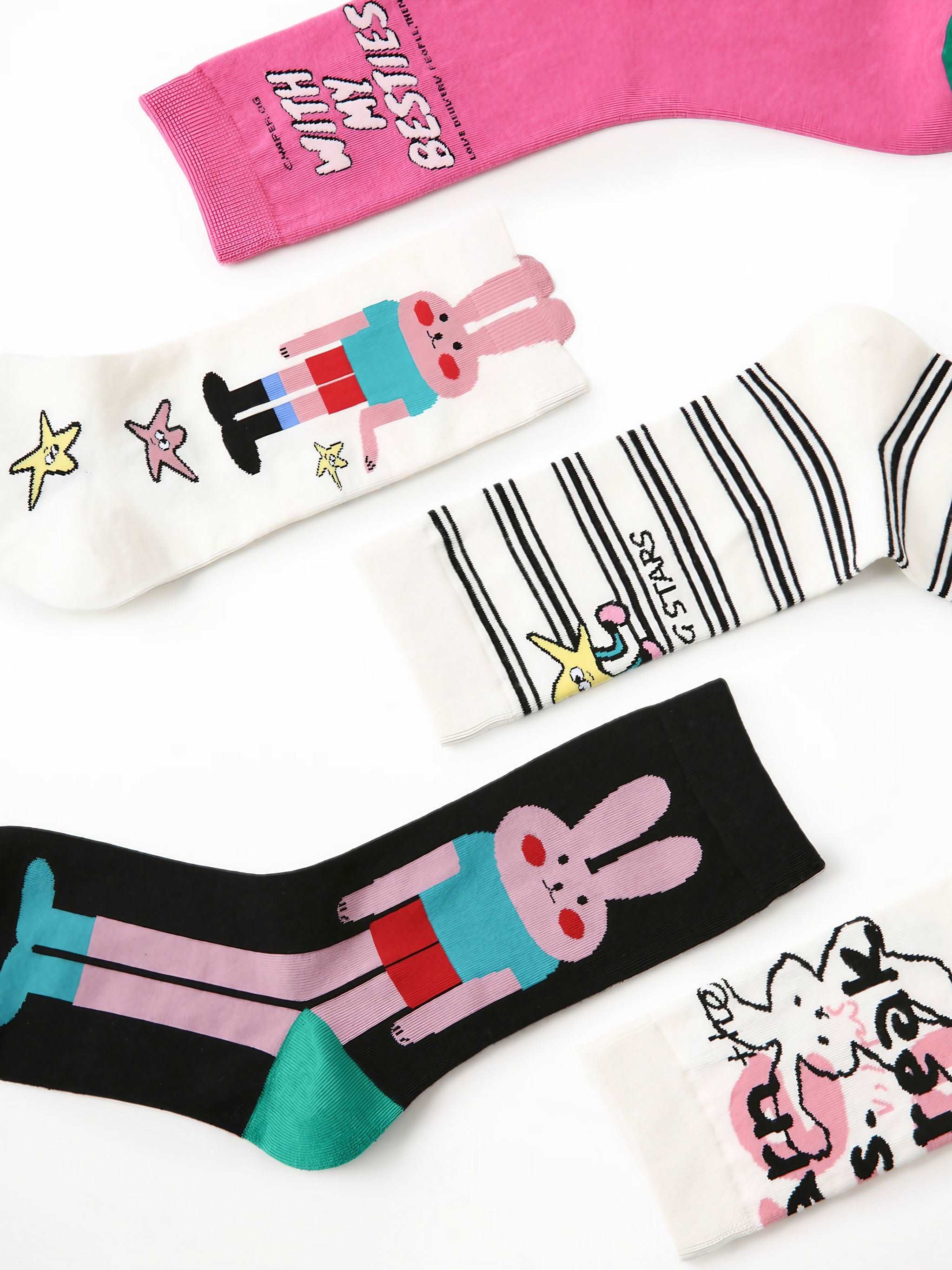 Assorted collection of rabbit and K-Pop themed socks for women