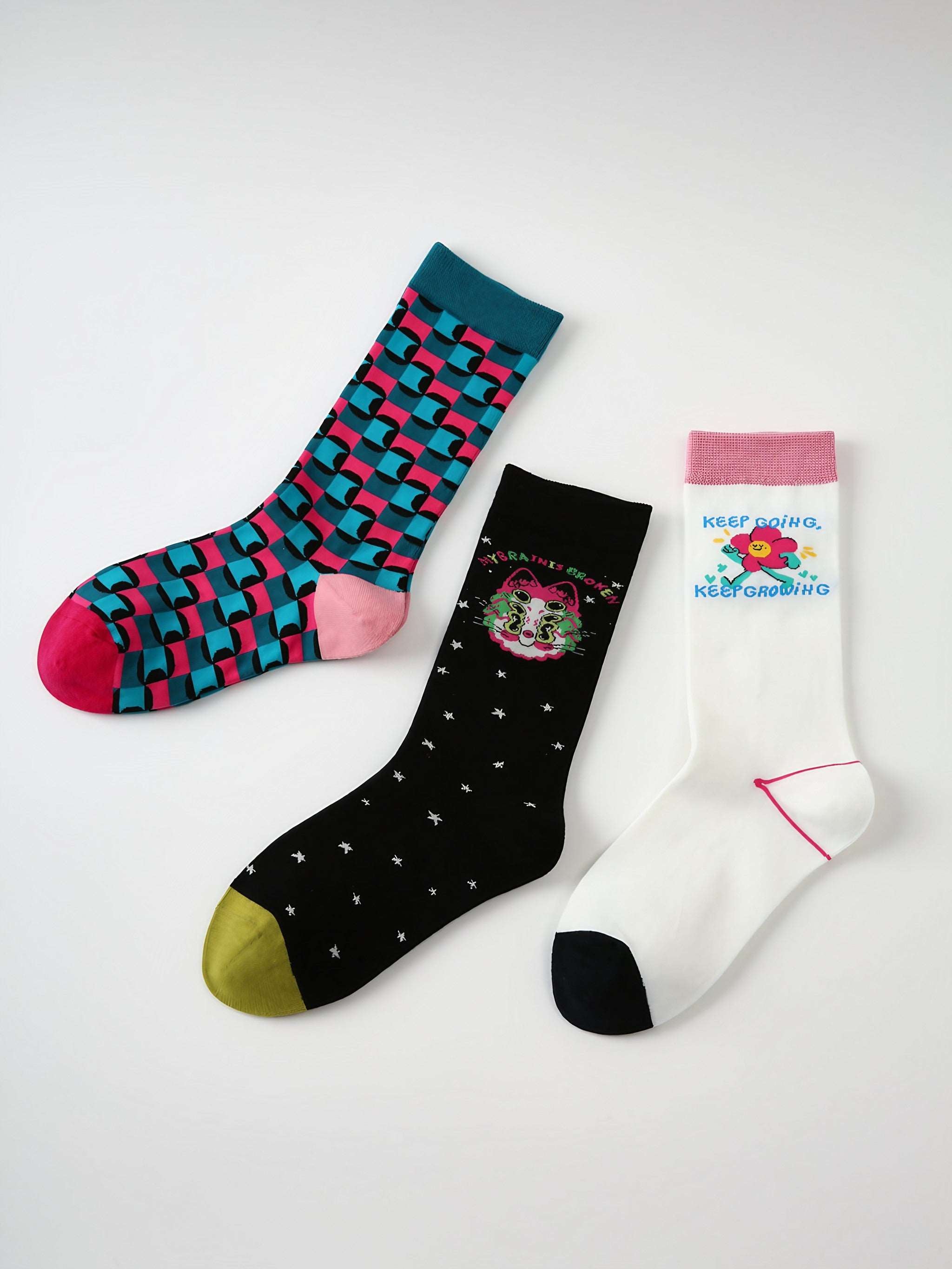 Set of three pairs of socks featuring vibrant patterns