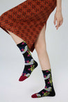 Skirt and colorful Blackpink socks combination for a playful, youthful outfit