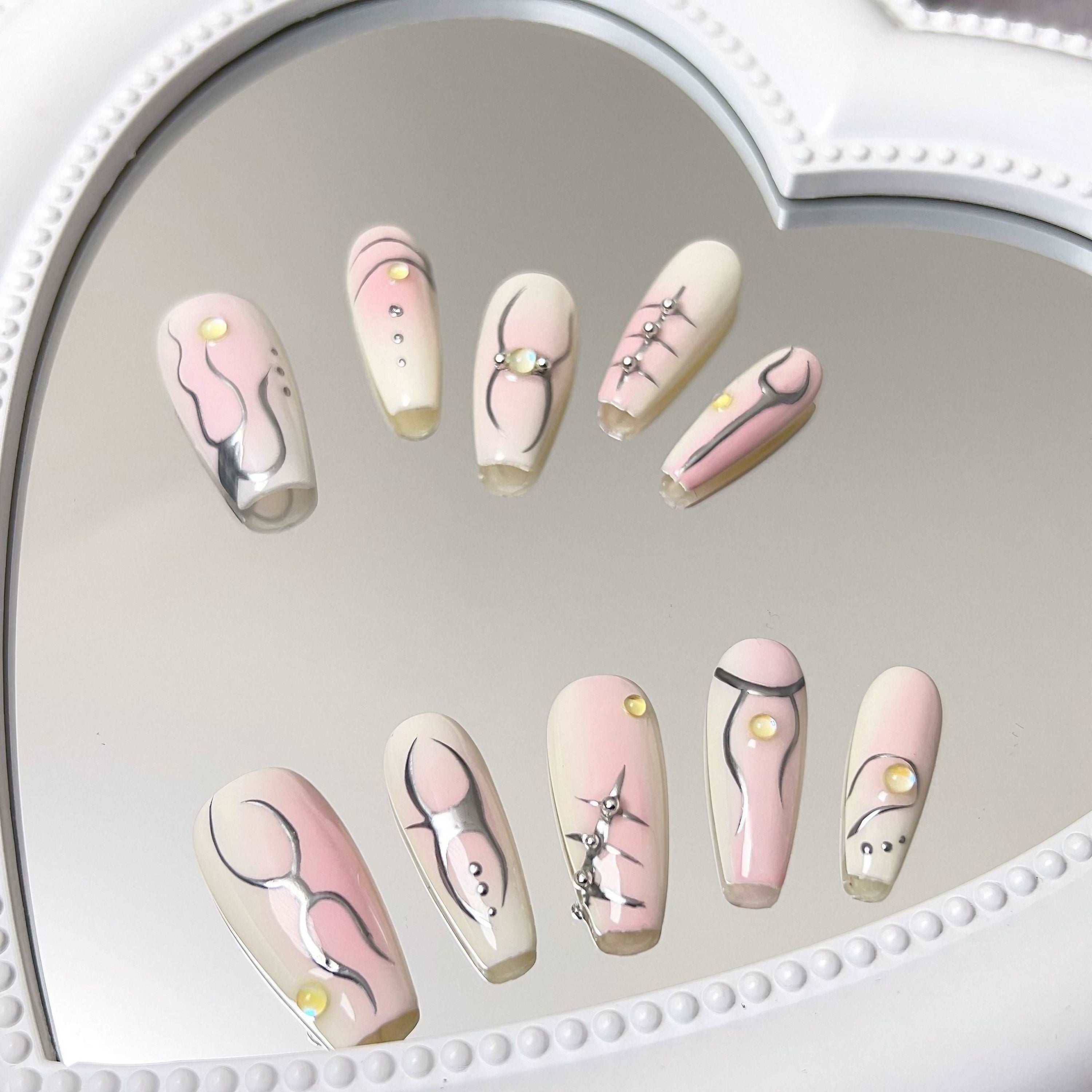 Elegant pink and white nail designs from Ballet Coquette Daily Nails collection