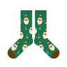 A pair of holiday socks showcasing Santa Claus and Christmas tree designs