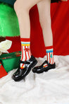 Striped red socks suitable for pairing with holiday footwear