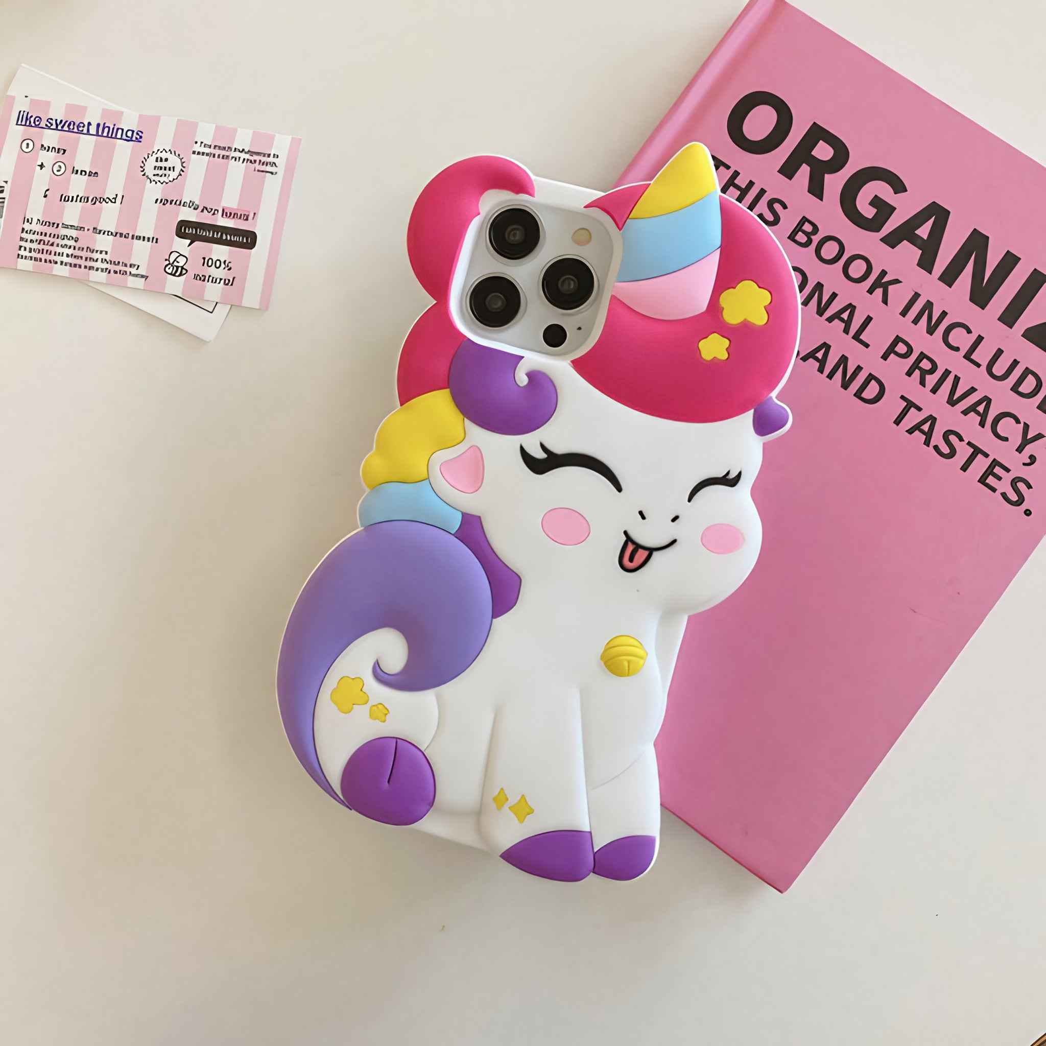 Pink and white unicorn pattern on a durable phone case for iPhone 15 Pro