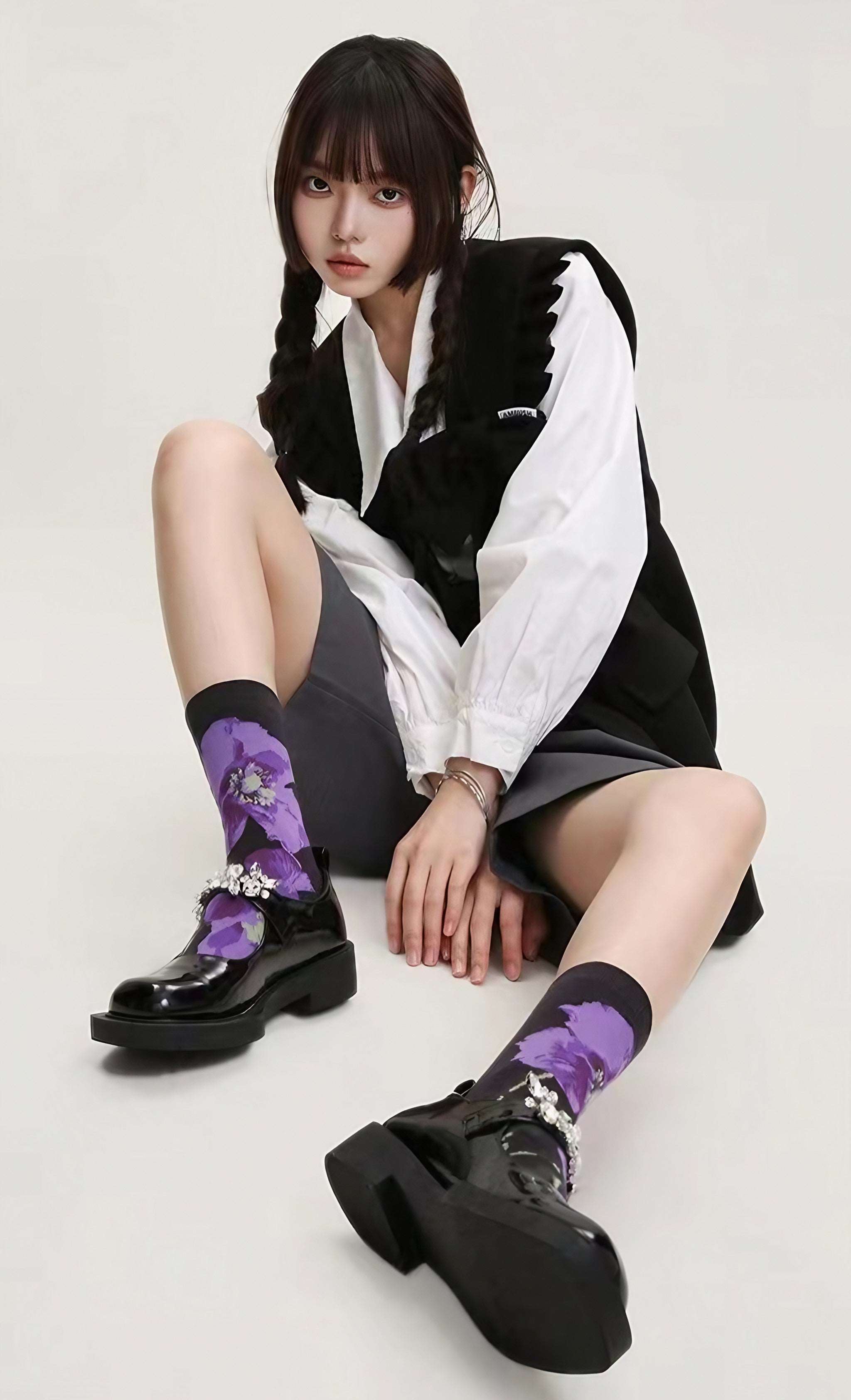 Stylish purple socks paired with chic black shoes for women