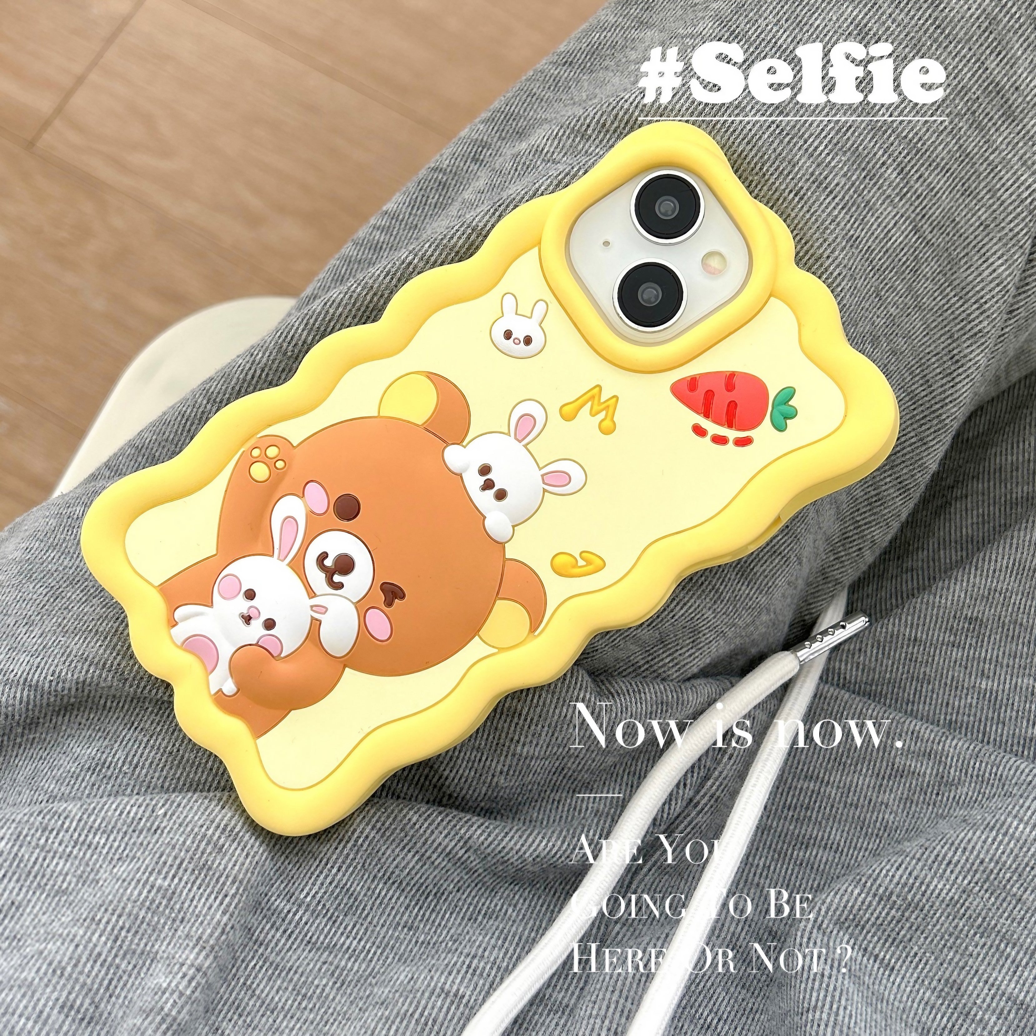 Soft silicone Rilakkuma iPhone case in yellow with bear and rabbit design for iPhone 14 series