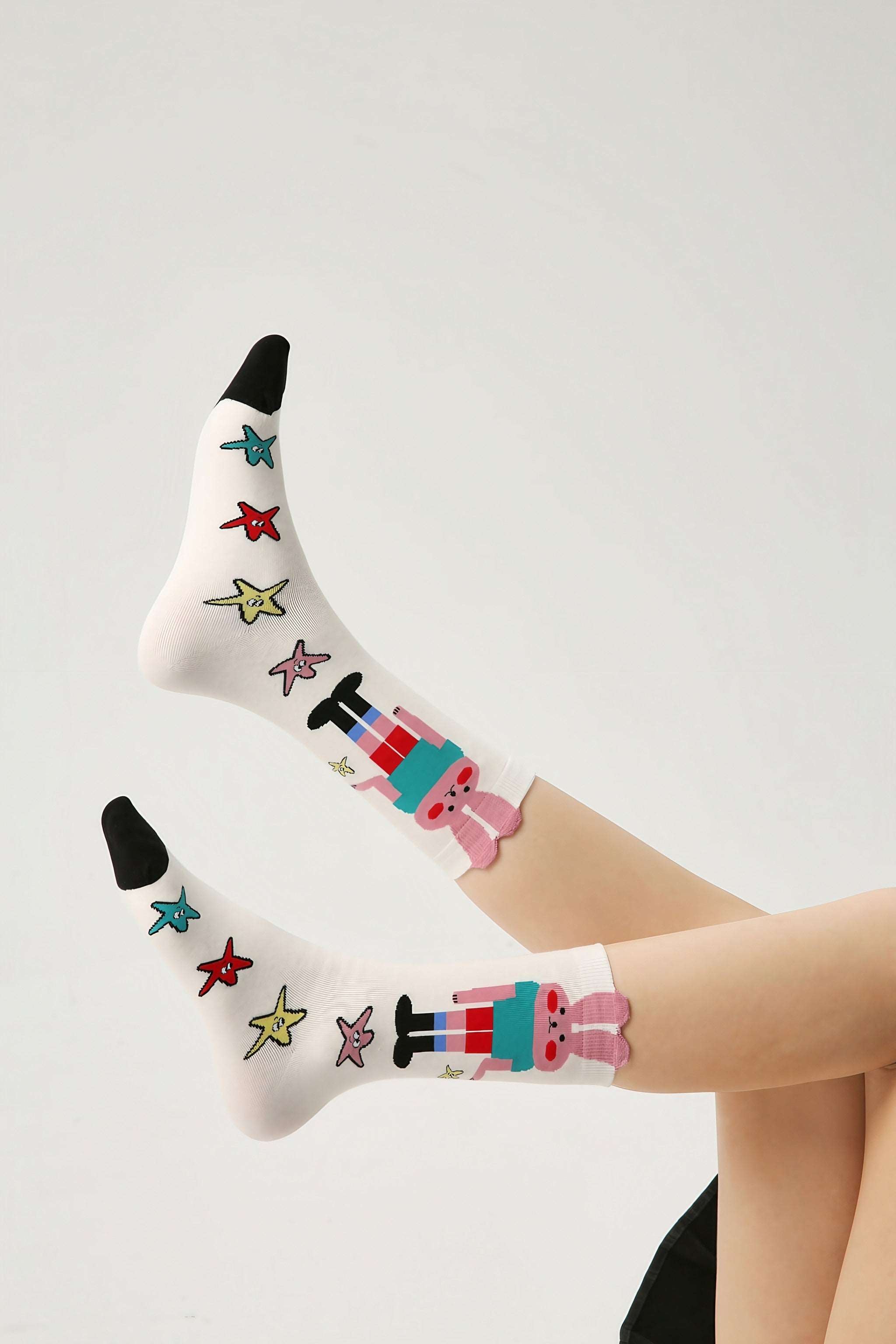 Close-up of cute rabbit-patterned socks from the 3+2 set for women