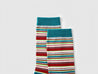 A chic pair of Blackpink Funky Socks with a multicolored striped pattern
