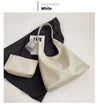 White and black autumn shoulder bag with included pouch