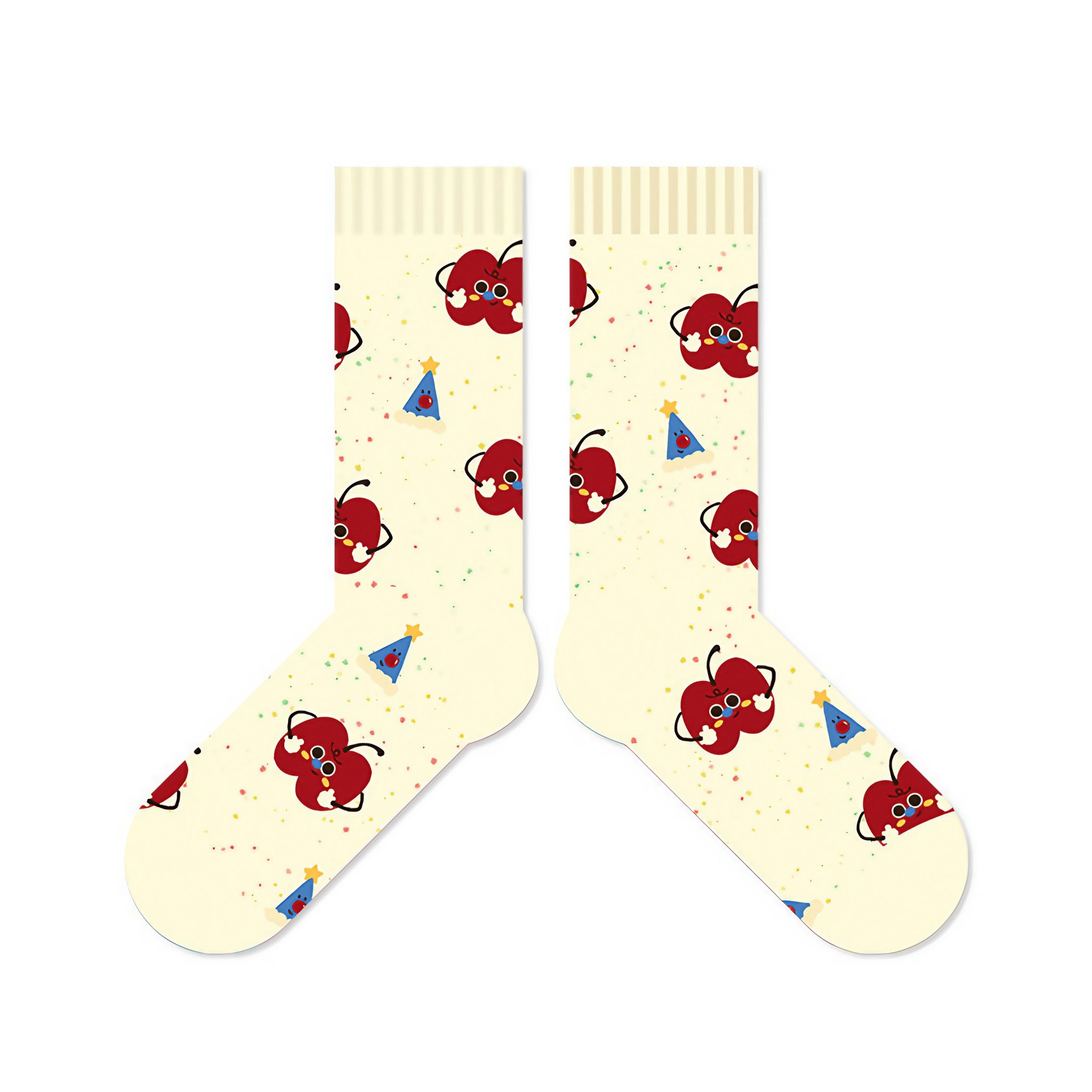 A spread out view of beige socks with festive apple characters