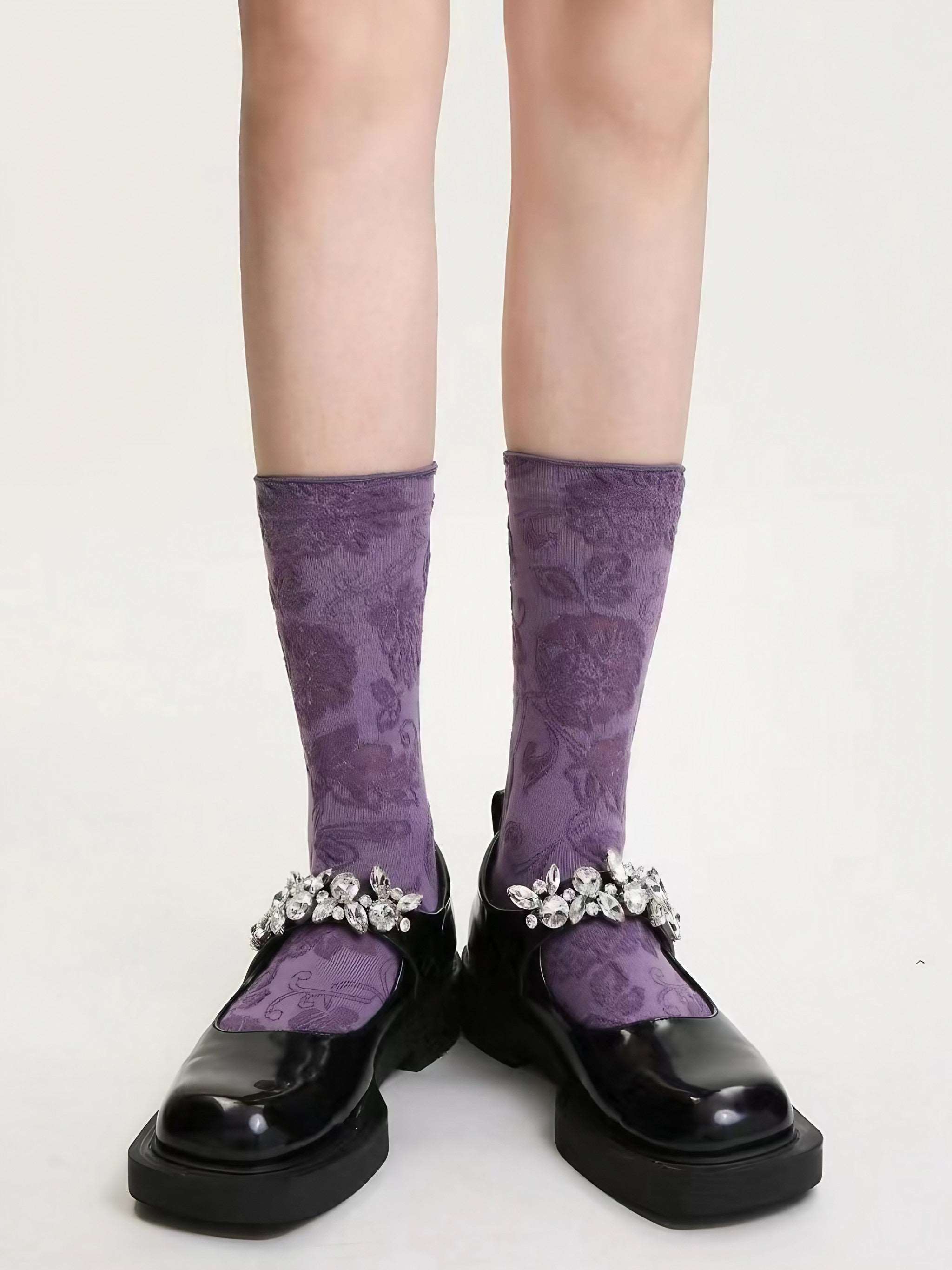 Pair of Black Purple Violet Old Money Socks for women paired with black footwear