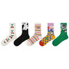 Set of five pairs of socks in black, white, green, yellow, and rainbow colors for women