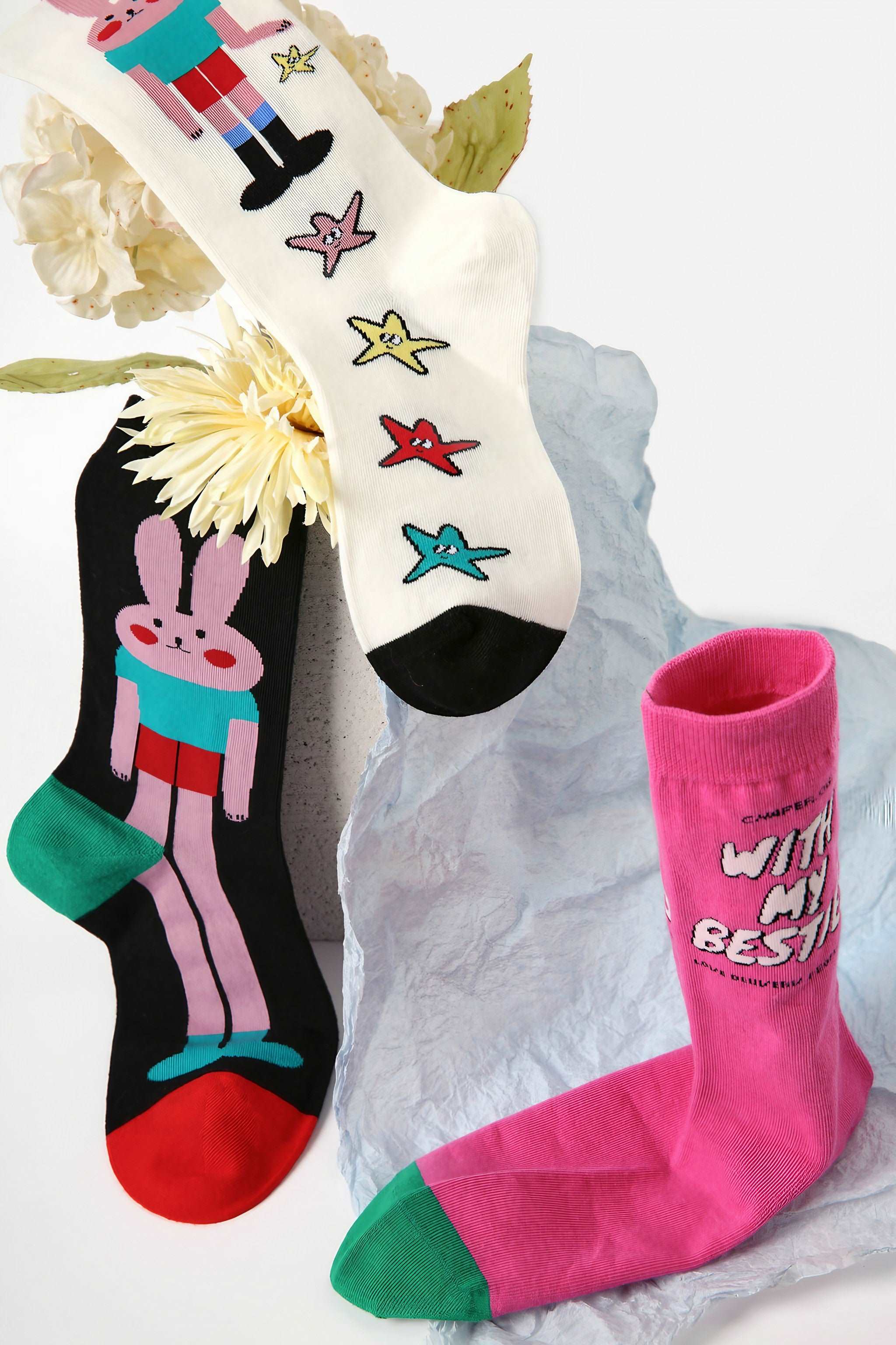 Trio of rabbit and K-Pop cartoon character socks for the Y2K fashion enthusiast