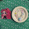 Decorative plate featuring a unique Hello Kitty necklace and a cute y2k girl decoration