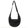 Versatile black canvas travel bag with adjustable strap