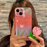 Hand model displaying the Pink Tulip iPhone Case with flower phone stand for iPhone 13 Pro