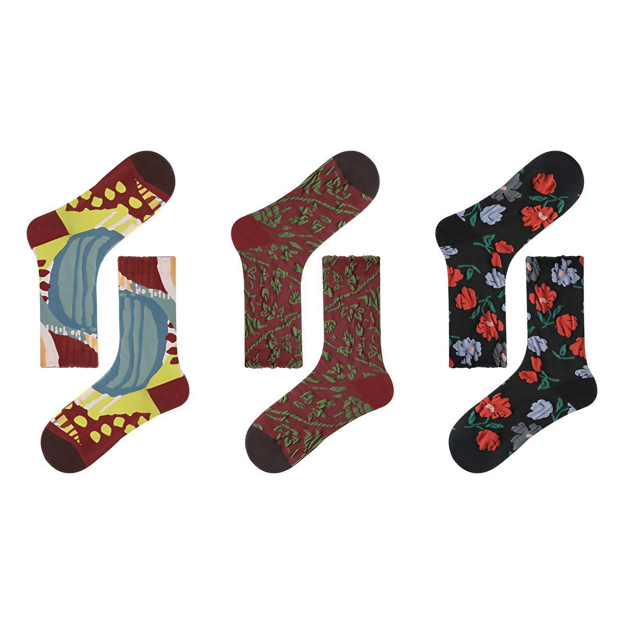 Collection of three pairs of autumnal socks with intricate floral patterns from the 1+2 Socks Set