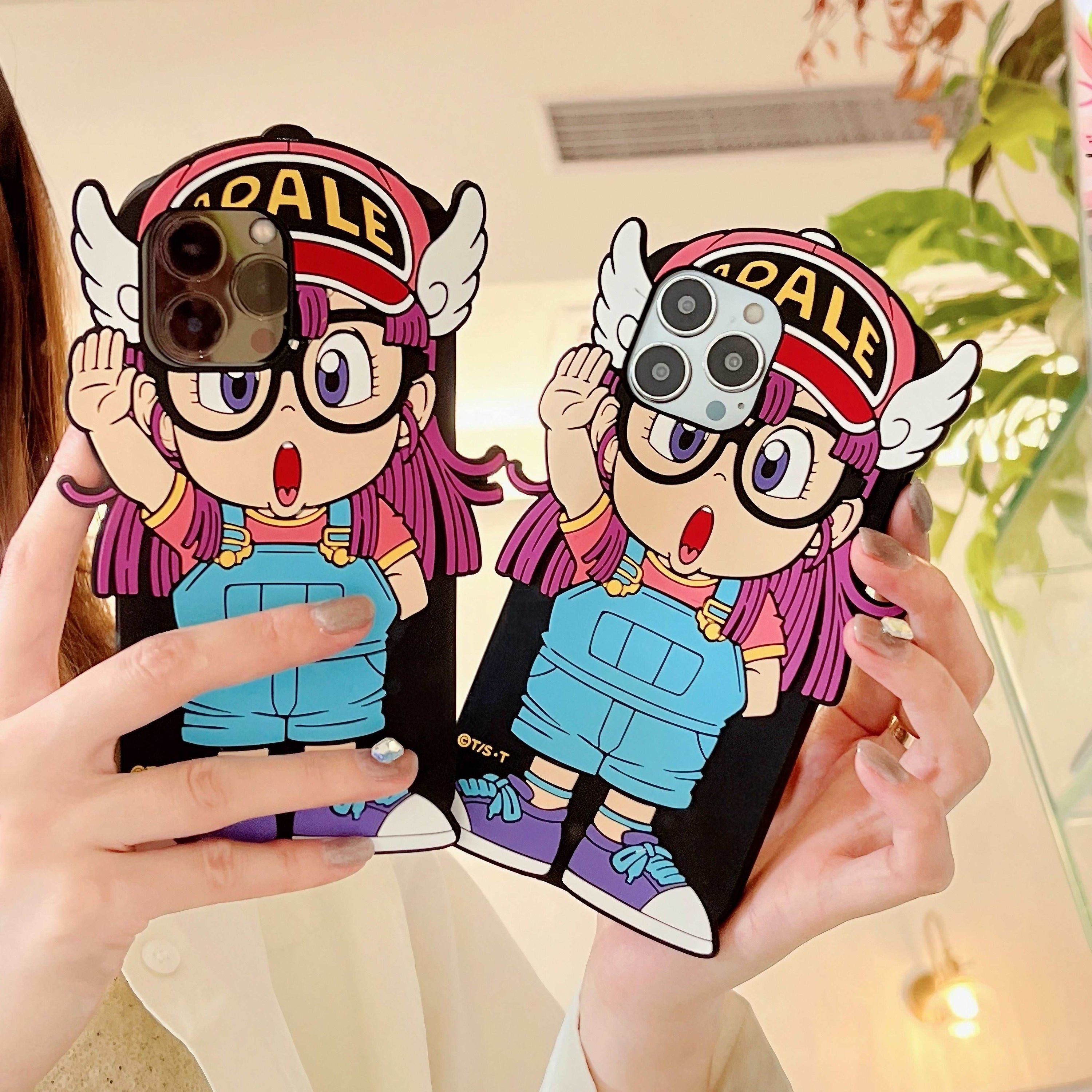 Woman presenting two cute Arale cartoon-themed iPhone cases