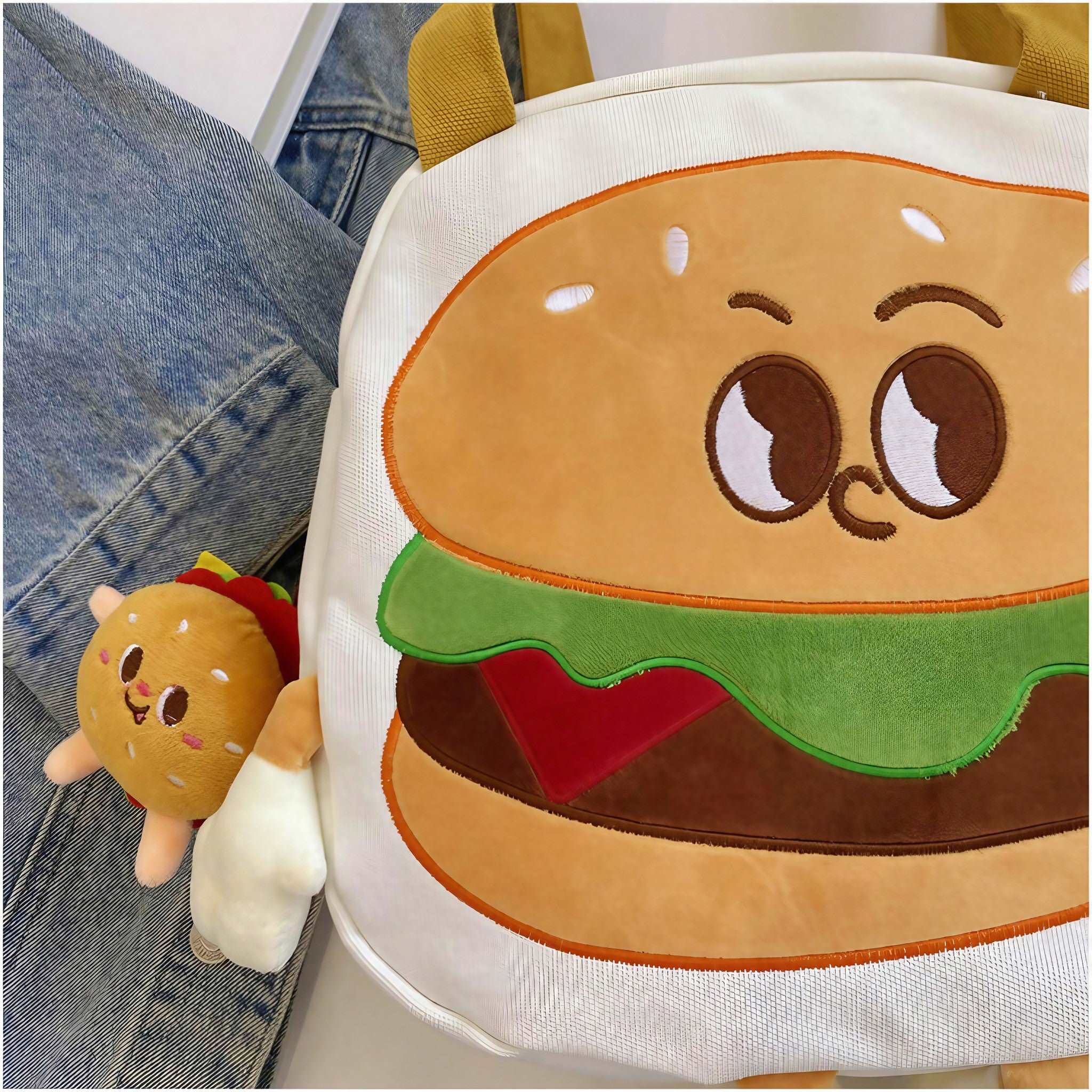 Adorable hamburger-style bag topped with a plush toy decoration