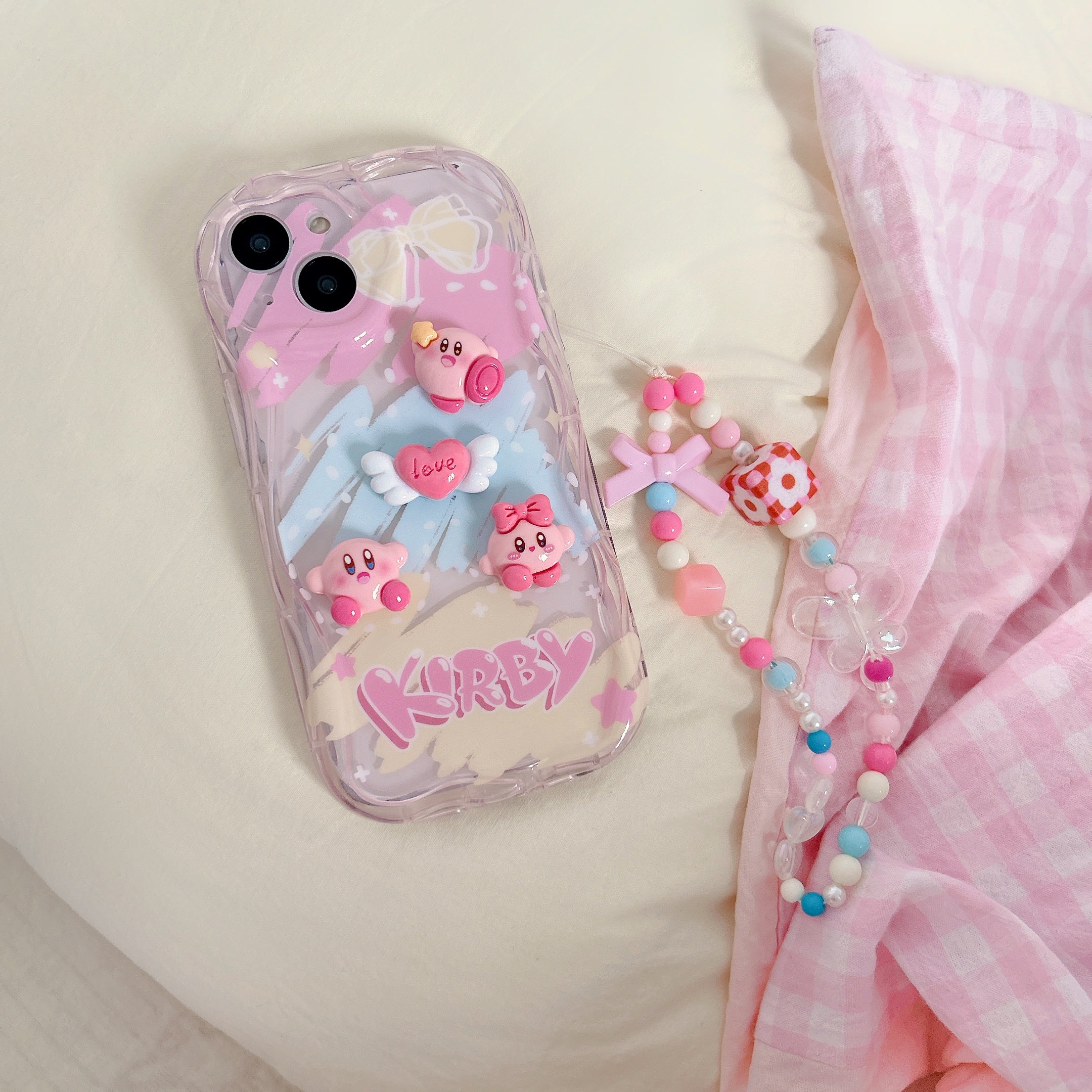 Cute Kirby pig design on a pink case for iPhone 14 series with coquette style