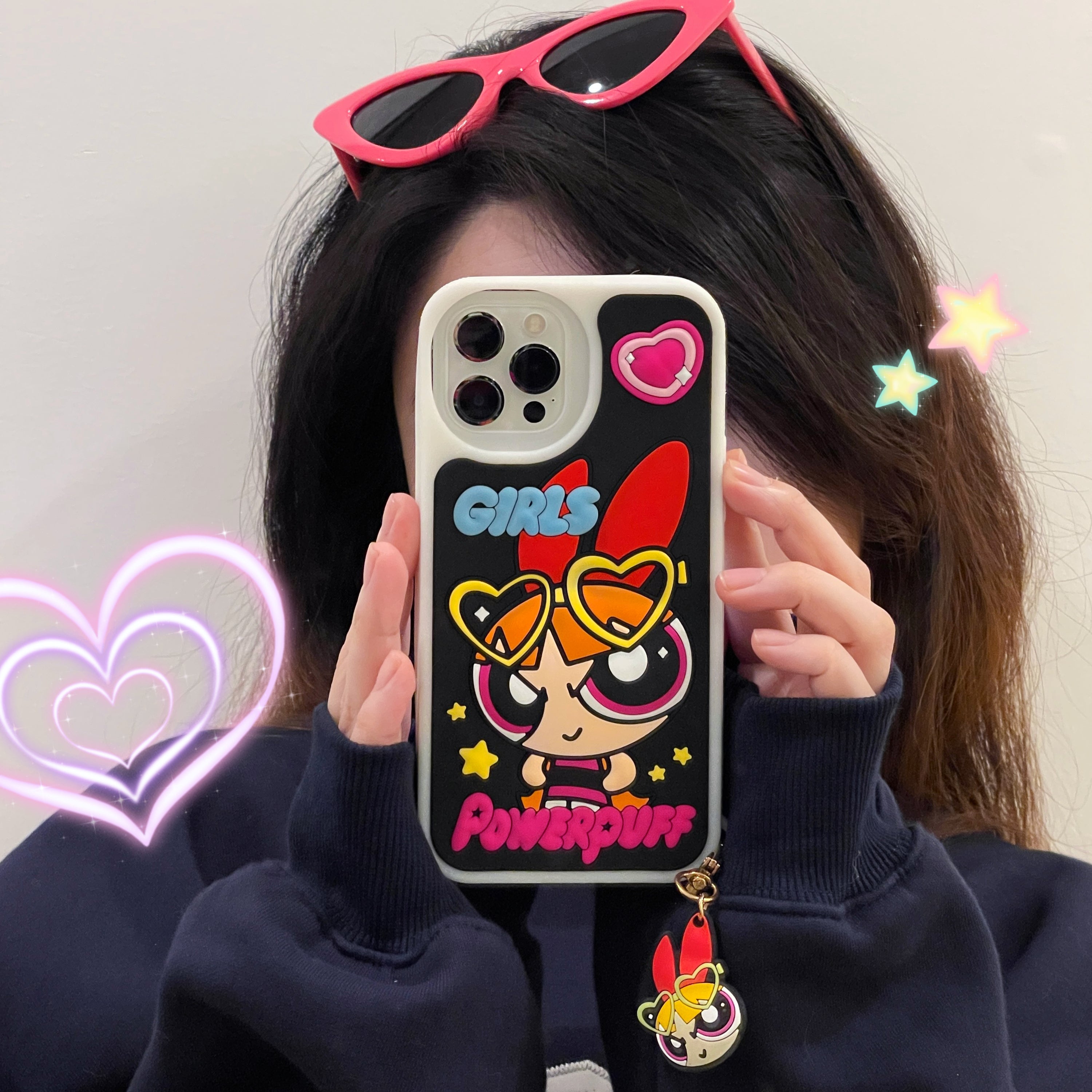 Hand displaying a Powerpuff Girls iPhone case suitable for iPhone 14 and 13 Pro series with cute keyring