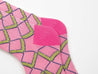 Set of three pairs of socks for women featuring pink hues and colorful patterns suitable for autumn and winter fashion