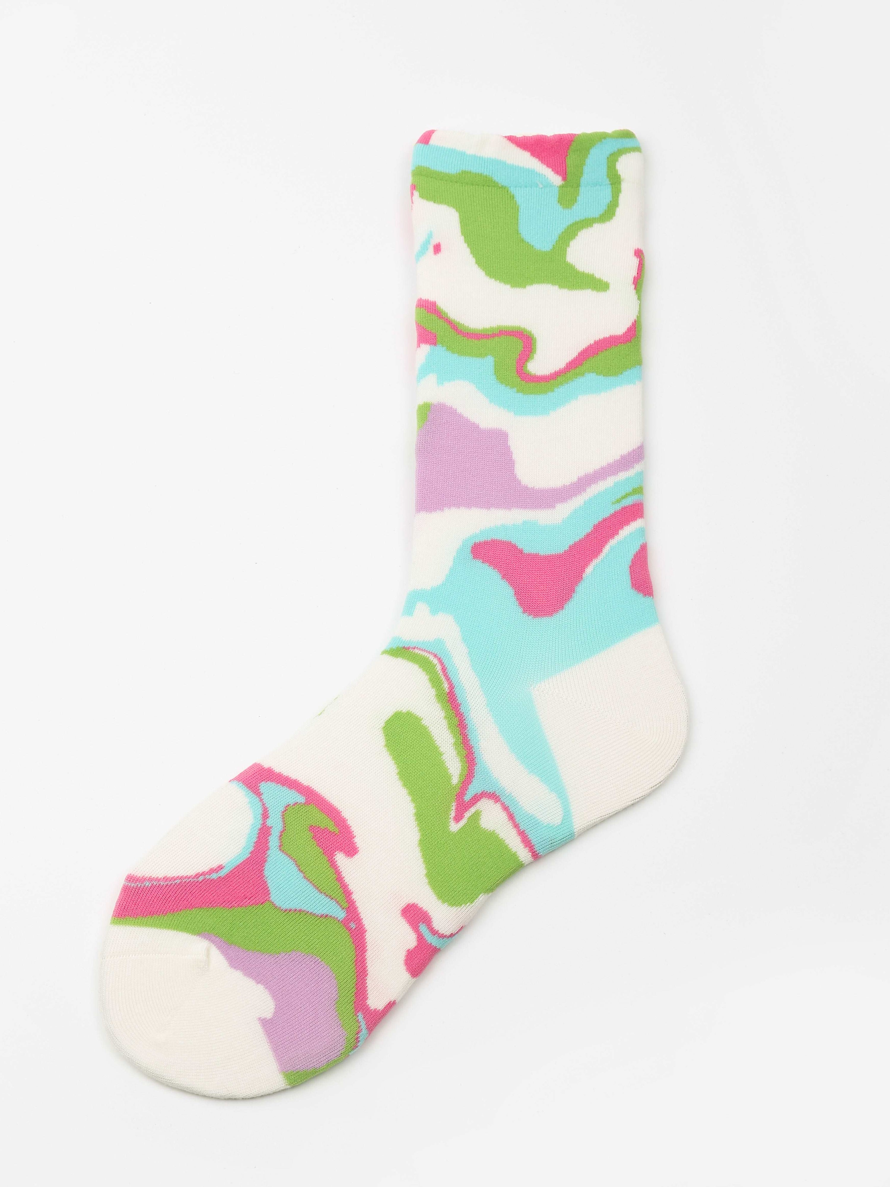 A single pink sock adorned with green and pink shapes from the 1+2 Socks Set