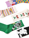 A variety of socks from the set, all showcasing different cartoon characters on each pair