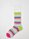 Assorted colorful socks for women laid out on a white surface