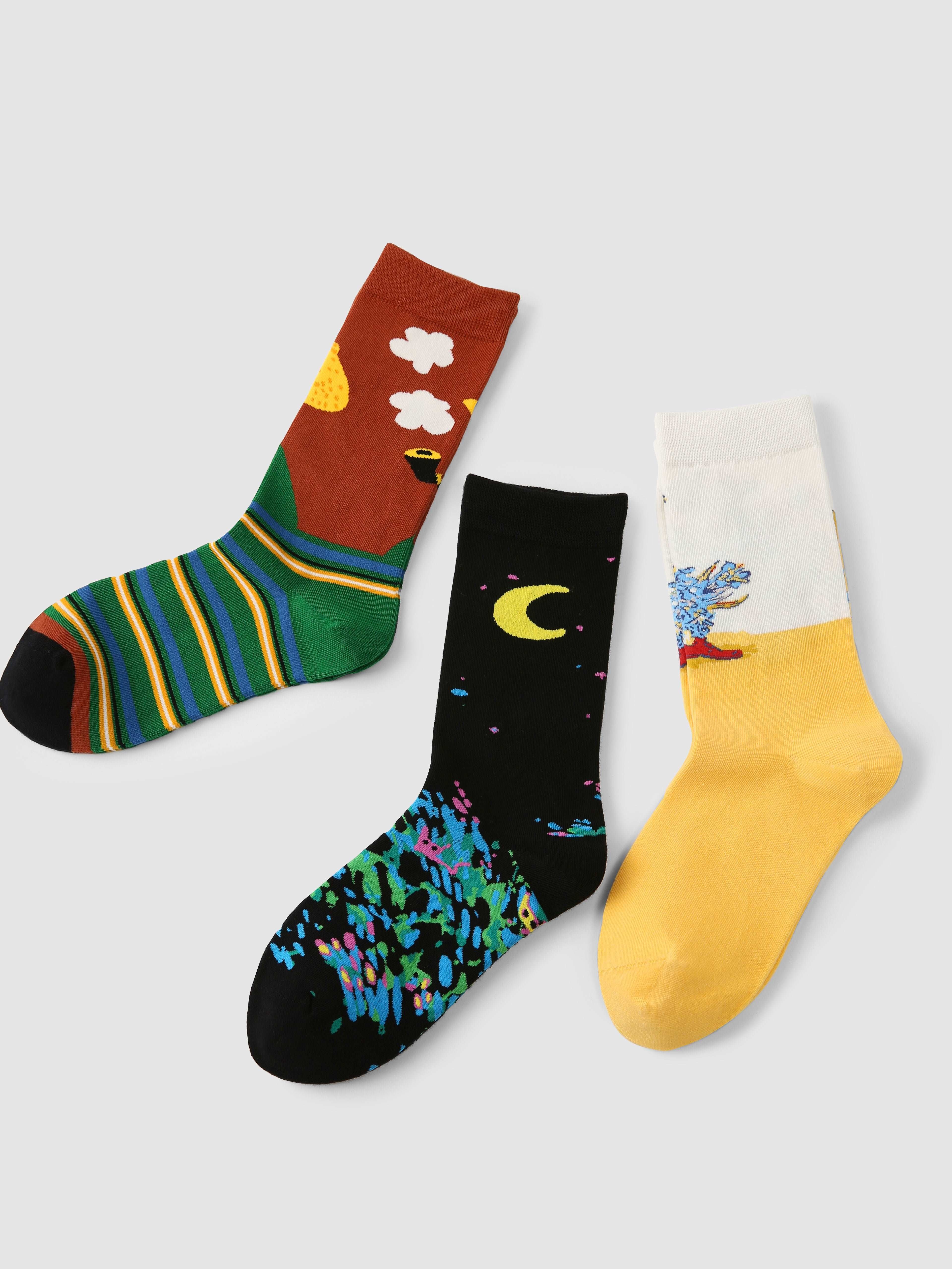 Set of three Starry Night inspired socks with cartoonish designs