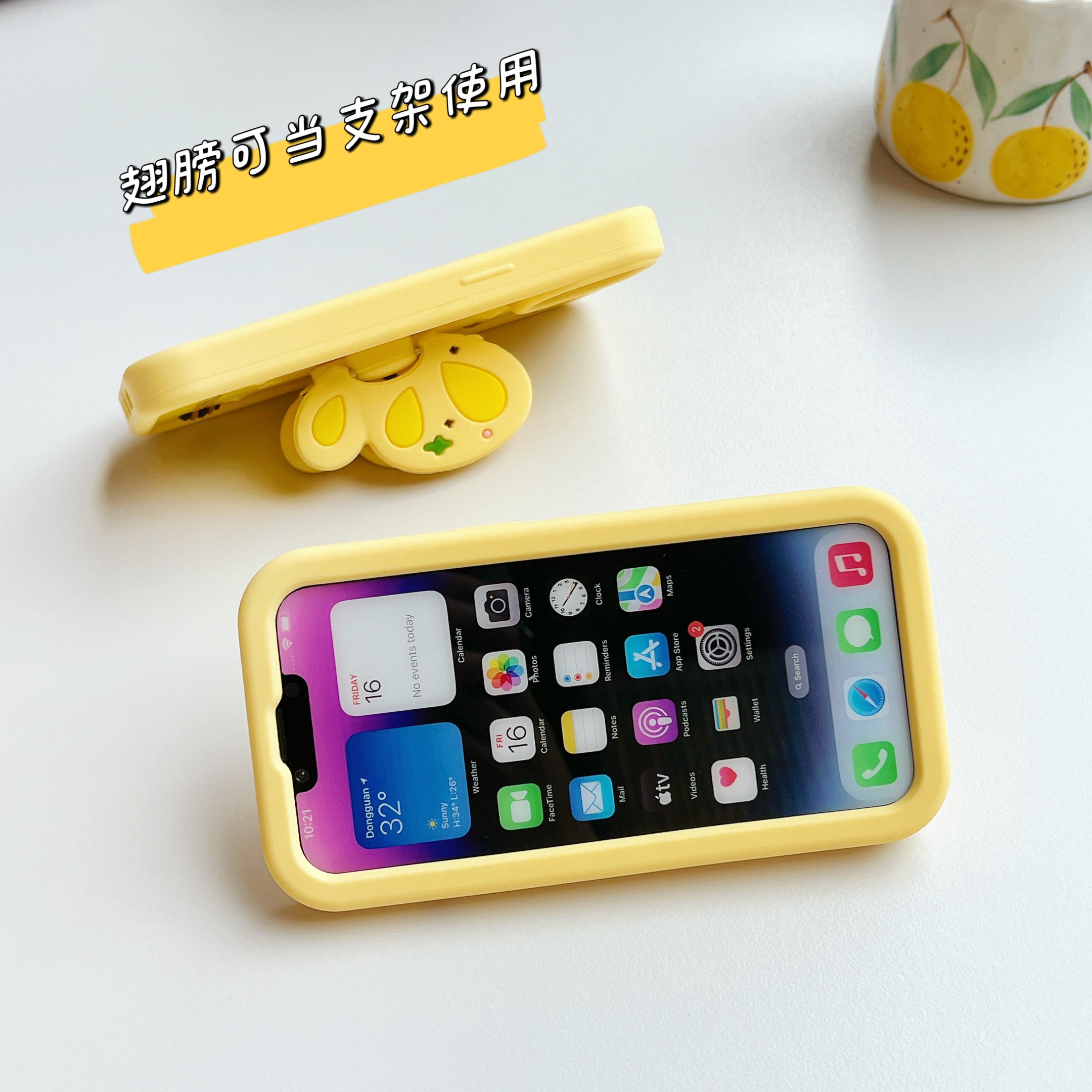 Yellow silicone iPhone cover with a cute bumble bee illustration compatible with iPhone 14 series