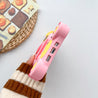 Hand presenting a pink and yellow Stitch iPhone case for iPhone 14