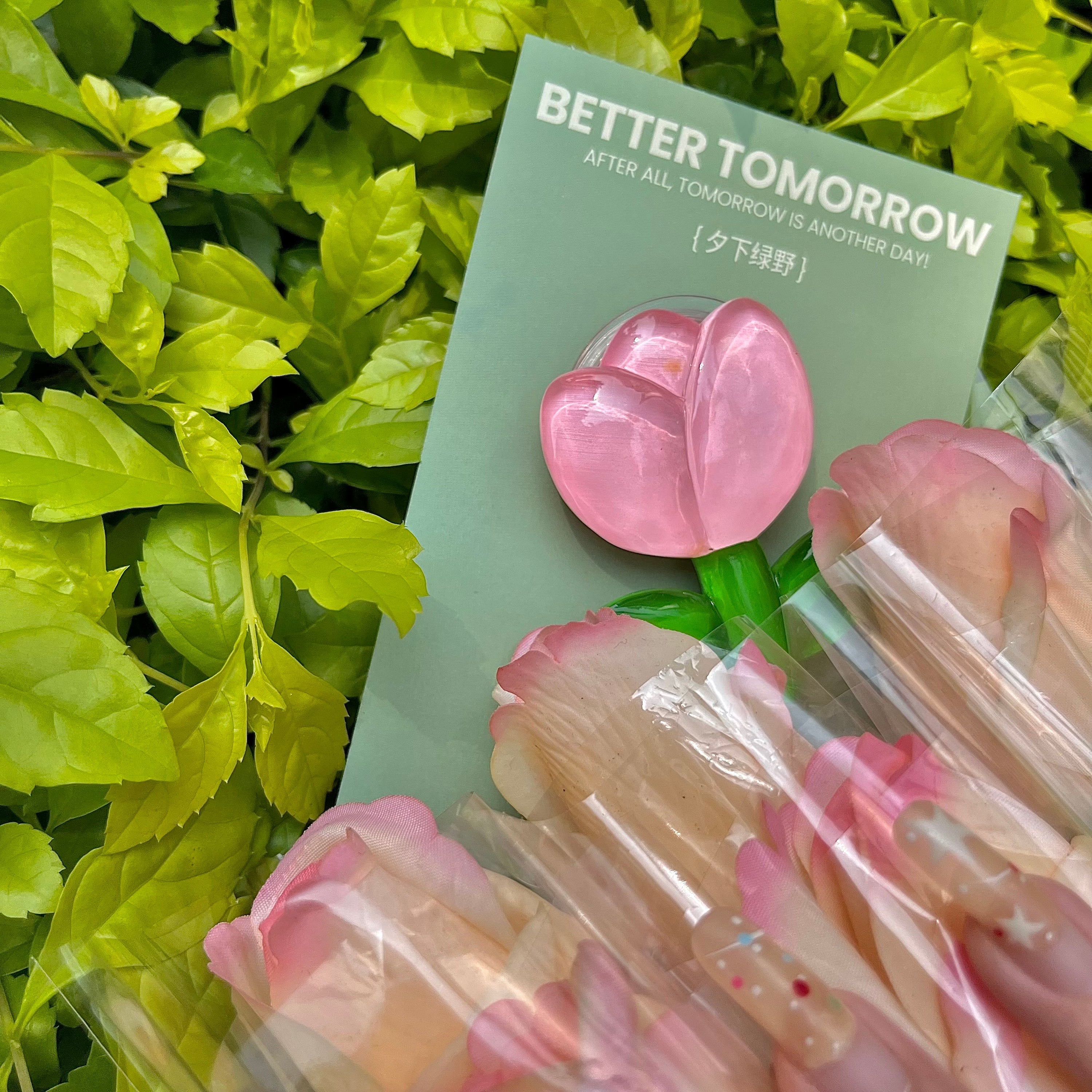 Pink Tulip iPhone Case with 'Better Tomorrow' quote and flower phone holder for a Y2K vibe for iPhone 14 Pro